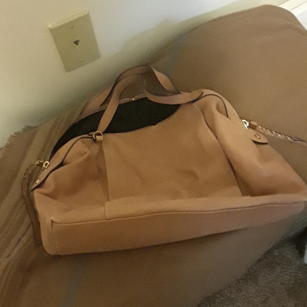 Soft leather, tan satchel.